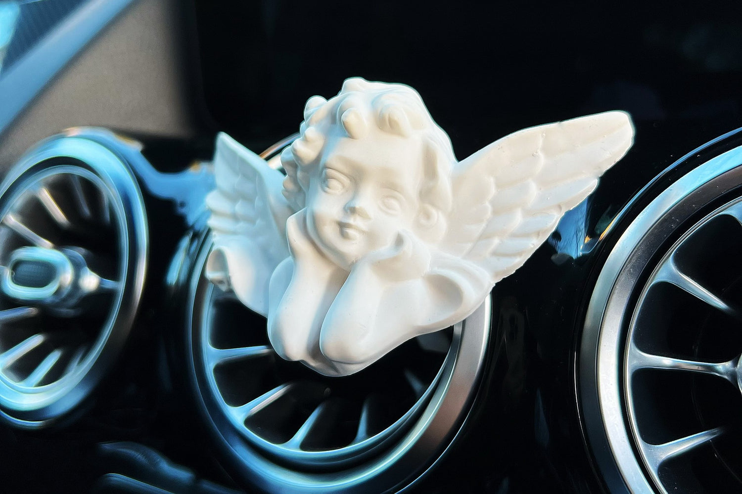 car with a Winged Angel car vent air freshener - LMJ Candles