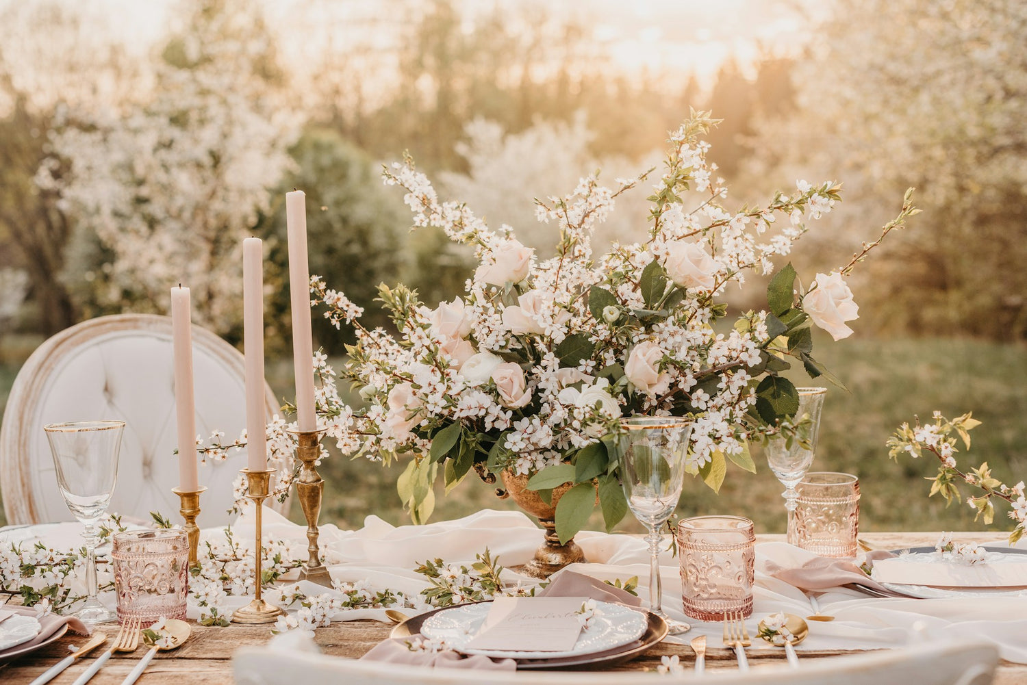 Romantic Wedding Tablescape: Elegant Rose Centrepieces and Candles for an Enchanting Reception